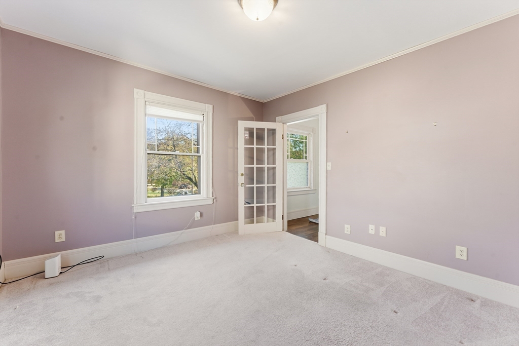 106 Magnolia Terrace Springfield, MA 01108 - Photo 31 of 42 an empty room with windows