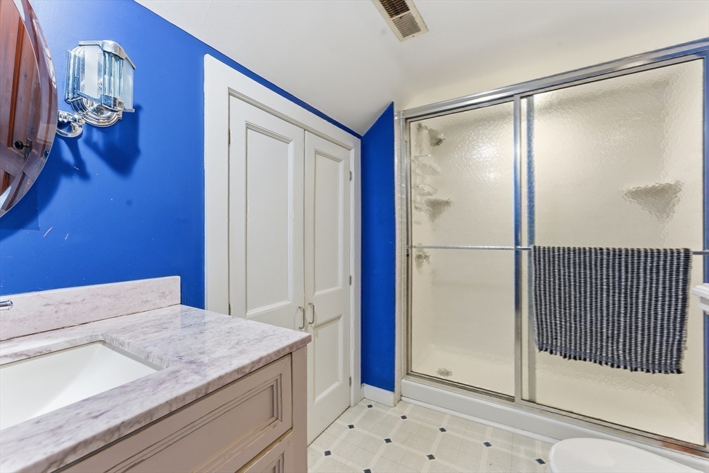 106 Magnolia Terrace Springfield, MA 01108 - Photo 37 of 42 a bathroom with a shower and a sink