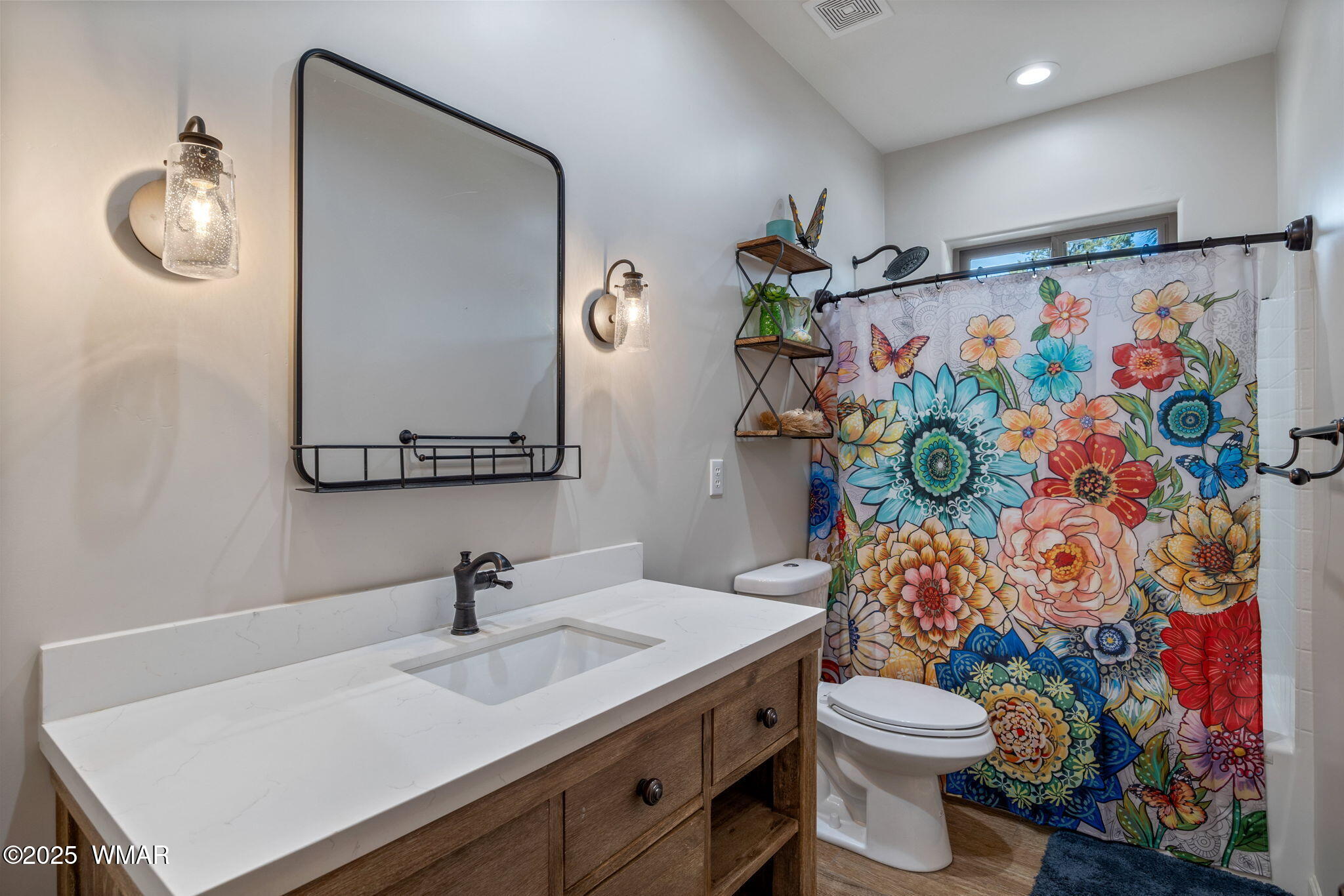 2841 Lodgepole Road Overgaard, AZ 85933 - Photo 23 of 44 a bathroom with a sink toilet and shower