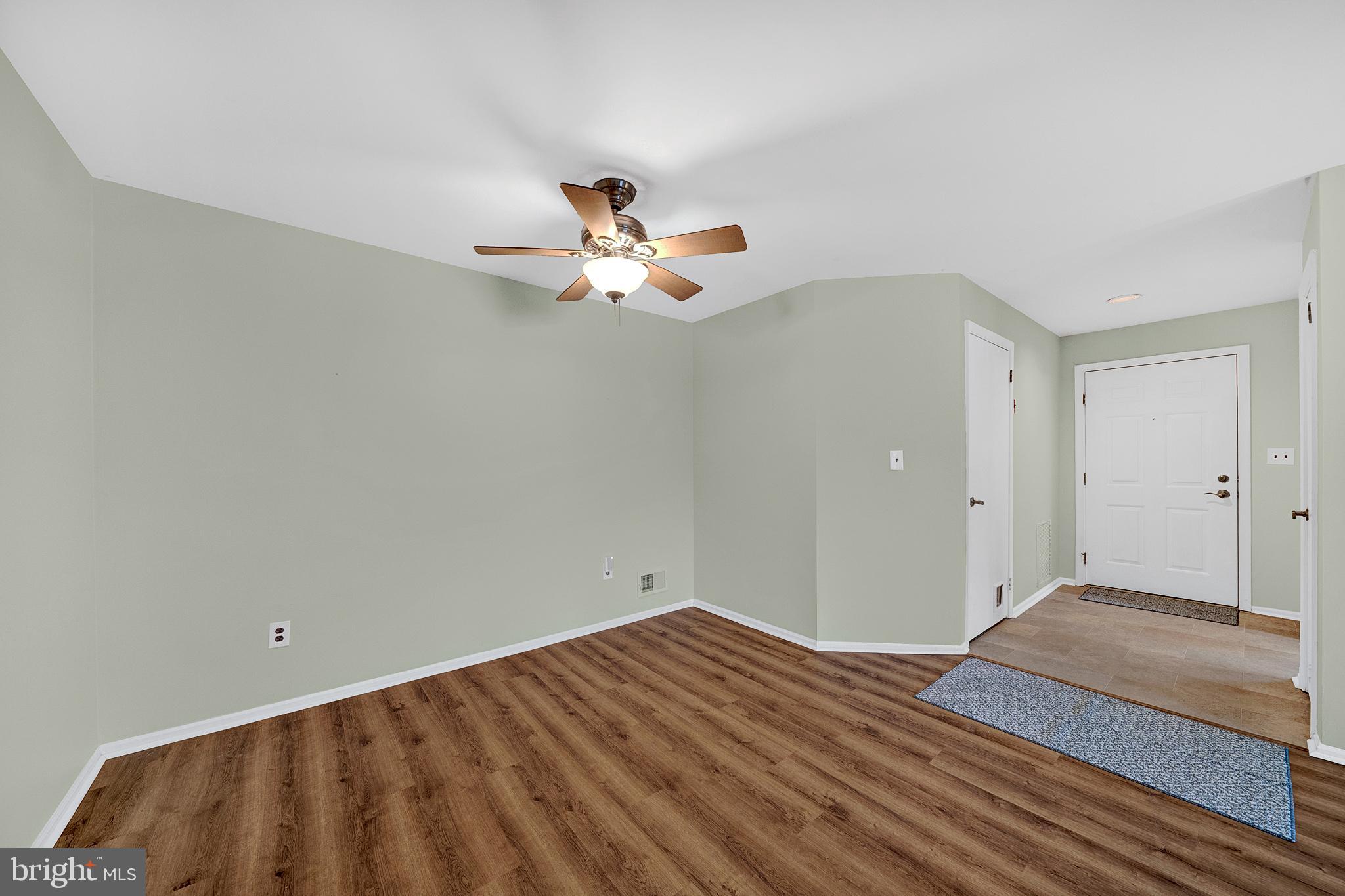 335 Silvia Street Ewing, NJ 08628 - Photo 11 of 25 a bedroom with a bed and a ceiling fan