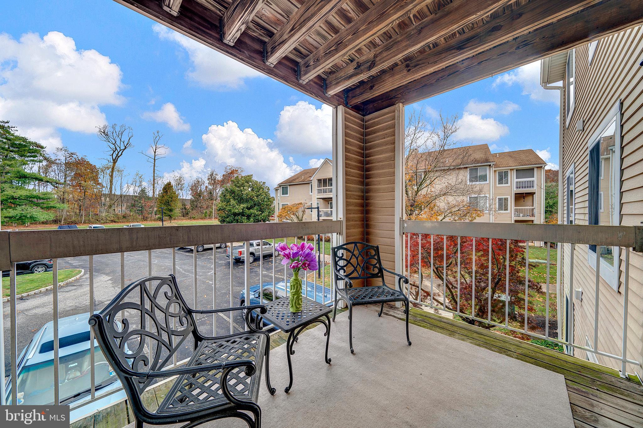 335 Silvia Street Ewing, NJ 08628 - Photo 23 of 25 a view of balcony with furniture