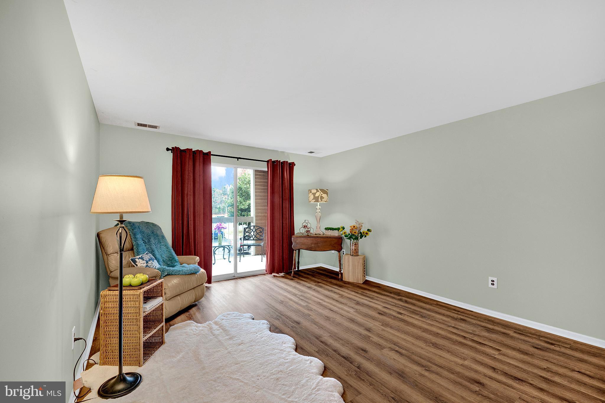 335 Silvia Street Ewing, NJ 08628 - Photo 7 of 25 a bedroom with furniture and a window