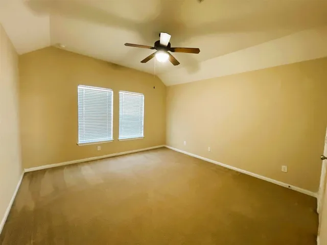 a view of a window in an empty room