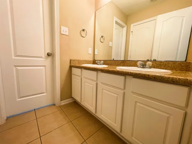 a bathroom with a shower and a shower