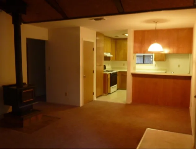 a view of a living room with a sink