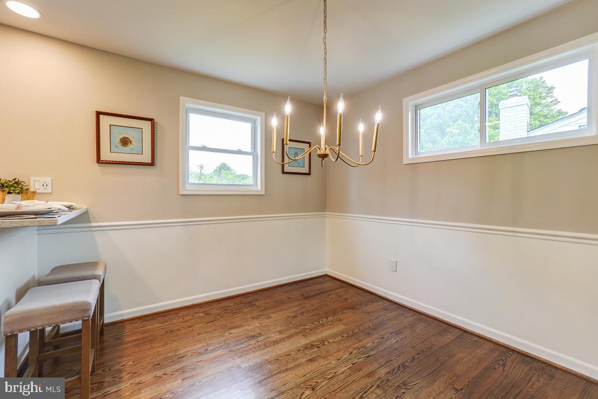 4801 Wyaconda Road Rockville, MD 20852 - Photo 13 of 48 New dining room matte gold chandelier