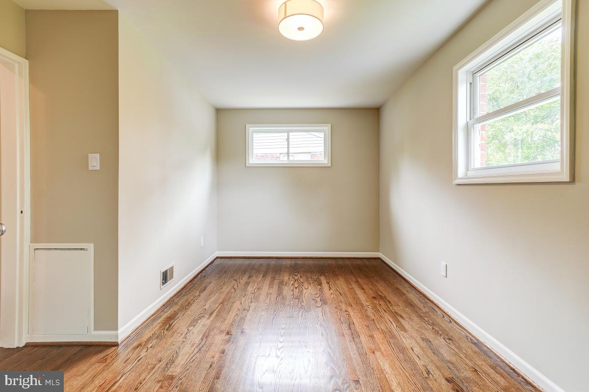 4801 Wyaconda Road Rockville, MD 20852 - Photo 28 of 48 Bedroom #3 w/ hardwood flooring