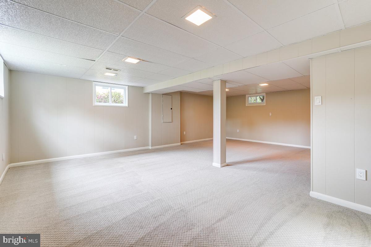 4801 Wyaconda Road Rockville, MD 20852 - Photo 36 of 48 Indoor soccer? This is a spacious family room!