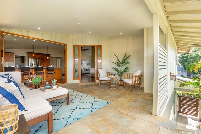 a living room with furniture and a table