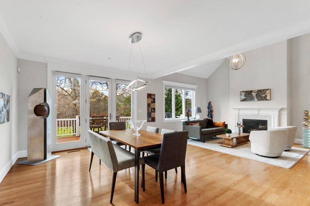 37 Crenshaw Lane, Unit 37 Andover, MA 01810 - Photo 13 of 40 a view of a dining room with furniture window and wooden floor