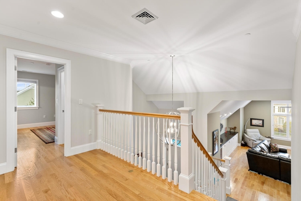 37 Crenshaw Lane, Unit 37 Andover, MA 01810 - Photo 25 of 40 a view of an entryway with wooden floor