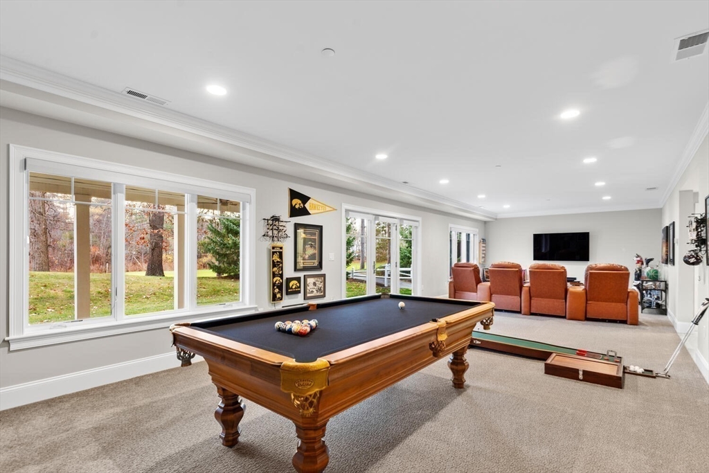 37 Crenshaw Lane, Unit 37 Andover, MA 01810 - Photo 33 of 40 a living room with furniture pool table and a large window