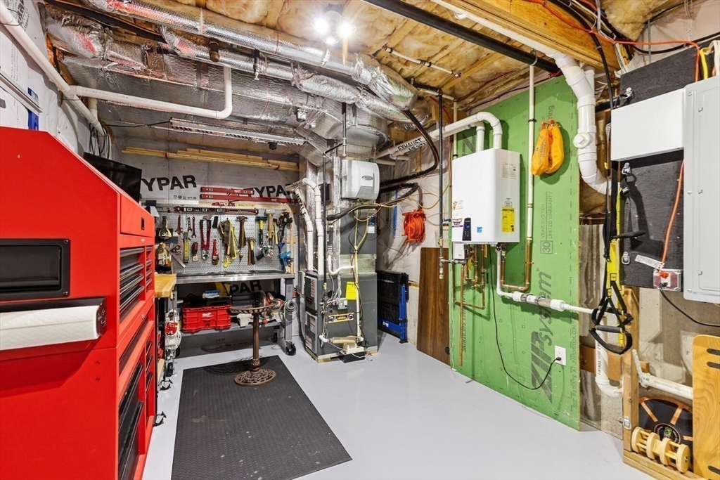 37 Crenshaw Lane, Unit 37 Andover, MA 01810 - Photo 35 of 40 a view of storage and utility room