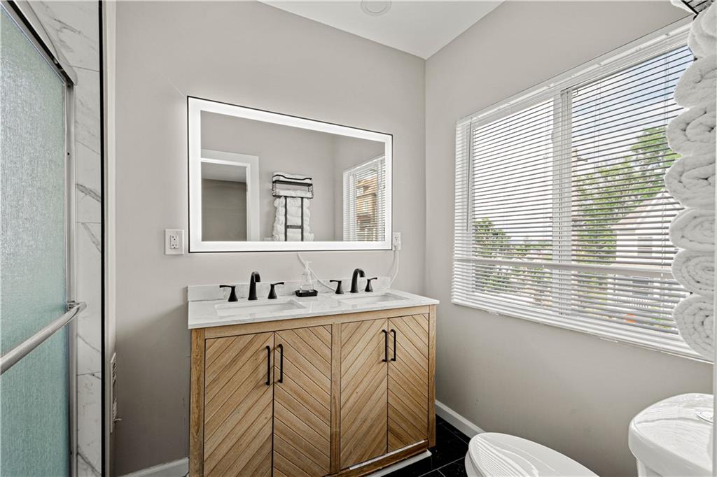 214 North Aiken Avenue Pittsburgh, PA 15206 - Photo 16 of 37 Double vanity with backlit LED mirror