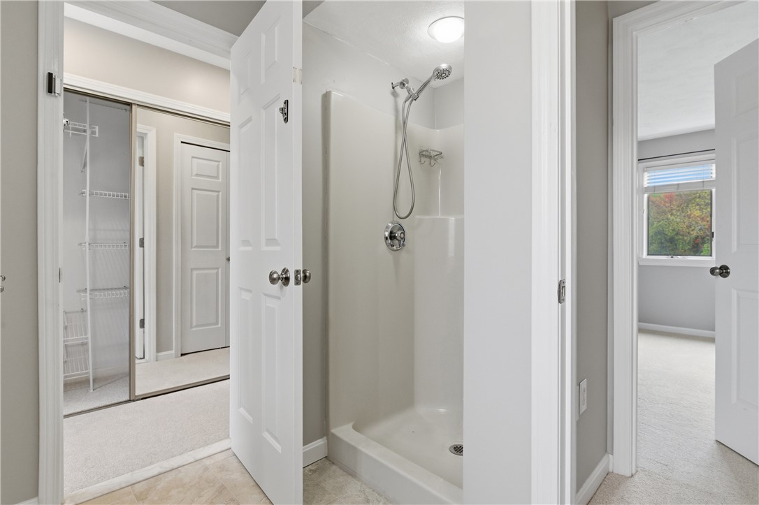 50 Abbott Run Valley Road, Unit 1604 Cumberland, RI 02864 - Photo 16 of 30 Bathroom with tub and shower off of the Master bedroom.