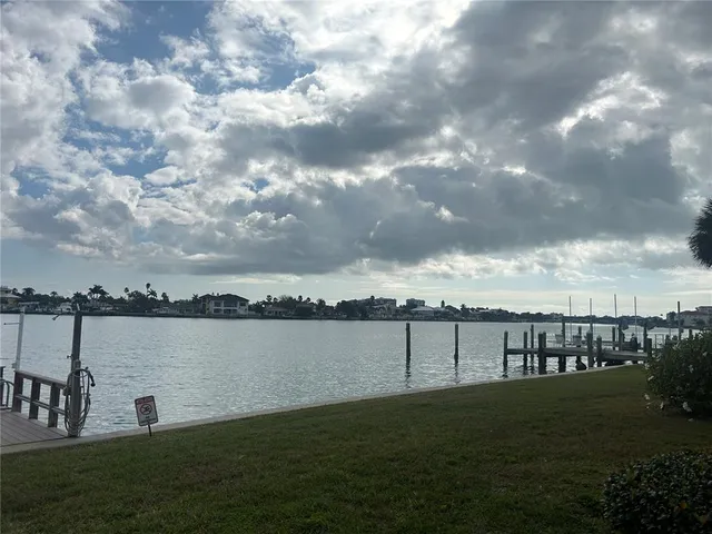 a view of a chairs and table in patio
