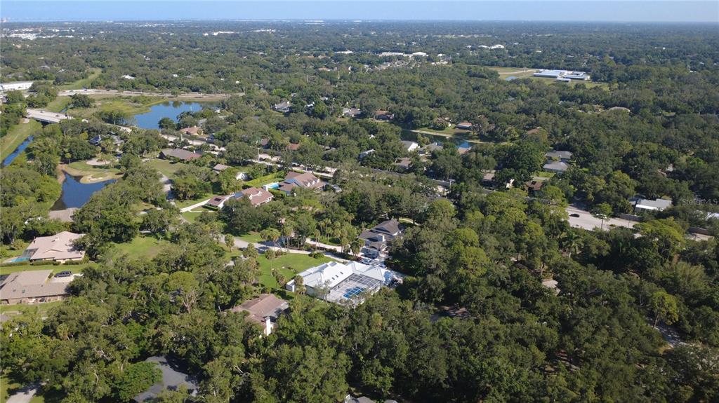 4632 Stone Ridge Trail Sarasota, FL 34232 - Photo 5 of 15 an aerial view of town with residential houses with outdoor space and trees
