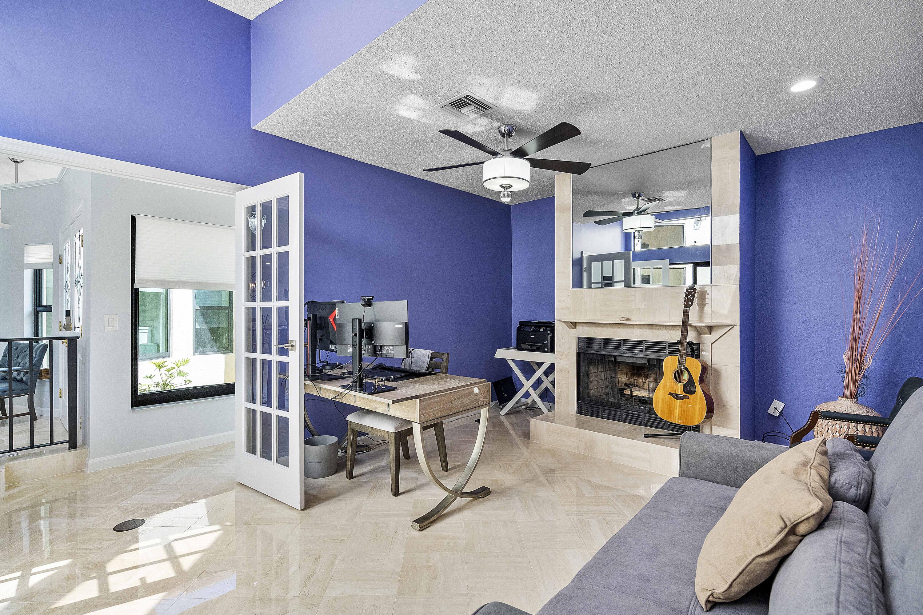 22652 Esplanada Circle Boca Raton, FL 33433 - Photo 13 of 44 a view of a livingroom with workspace and a window