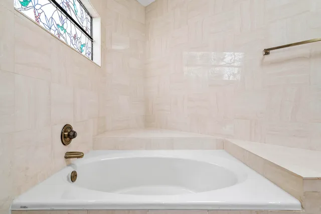 a bathroom with a bathtub