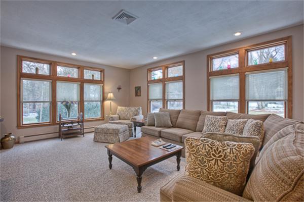 6 Random Lane Andover, MA 01810 - Photo 11 of 30 a living room with furniture and a large window