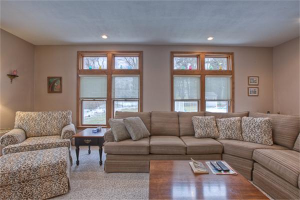 6 Random Lane Andover, MA 01810 - Photo 12 of 30 a living room with furniture and a large window