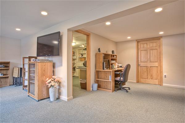 6 Random Lane Andover, MA 01810 - Photo 21 of 30 a view of a room with gym equipment