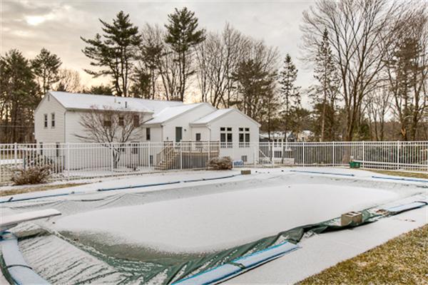 6 Random Lane Andover, MA 01810 - Photo 28 of 30 a front view of a house with garden