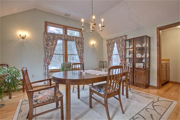 6 Random Lane Andover, MA 01810 - Photo 4 of 30 a view of a dining room with furniture and chandelier