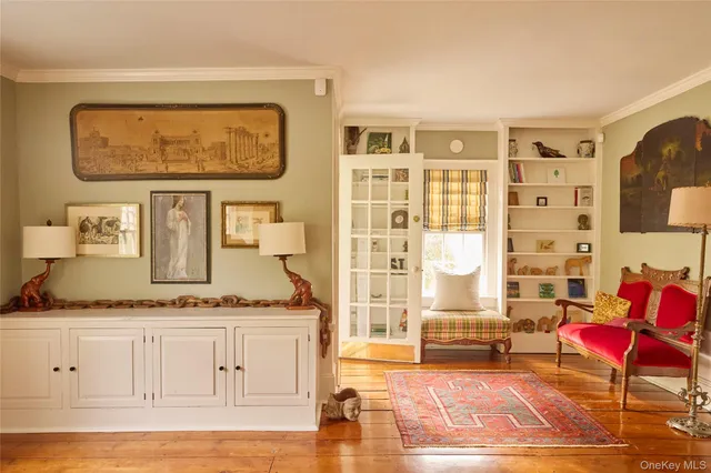 a living room with granite countertop furniture and a floor to ceiling window