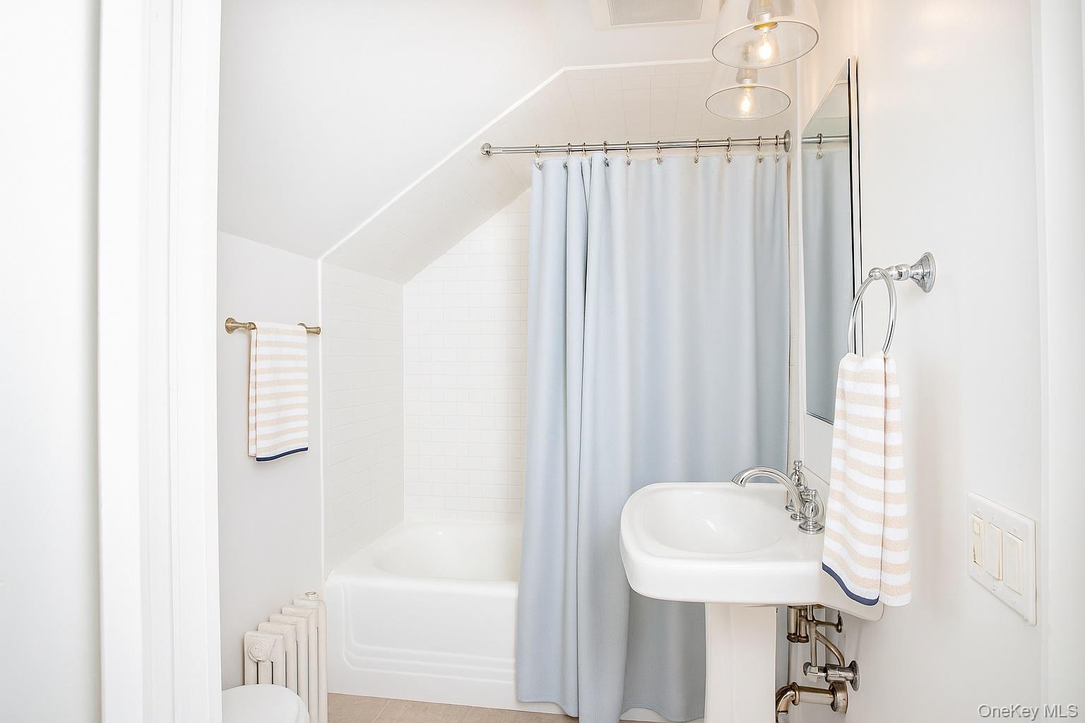 521 Barrett Hill Road Mahopac, NY 10541 - Photo 31 of 47 a bathroom with a sink and mirror