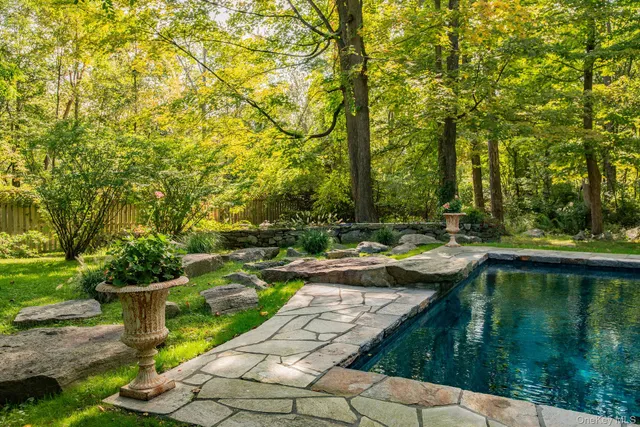 a view of swimming pool from a patio