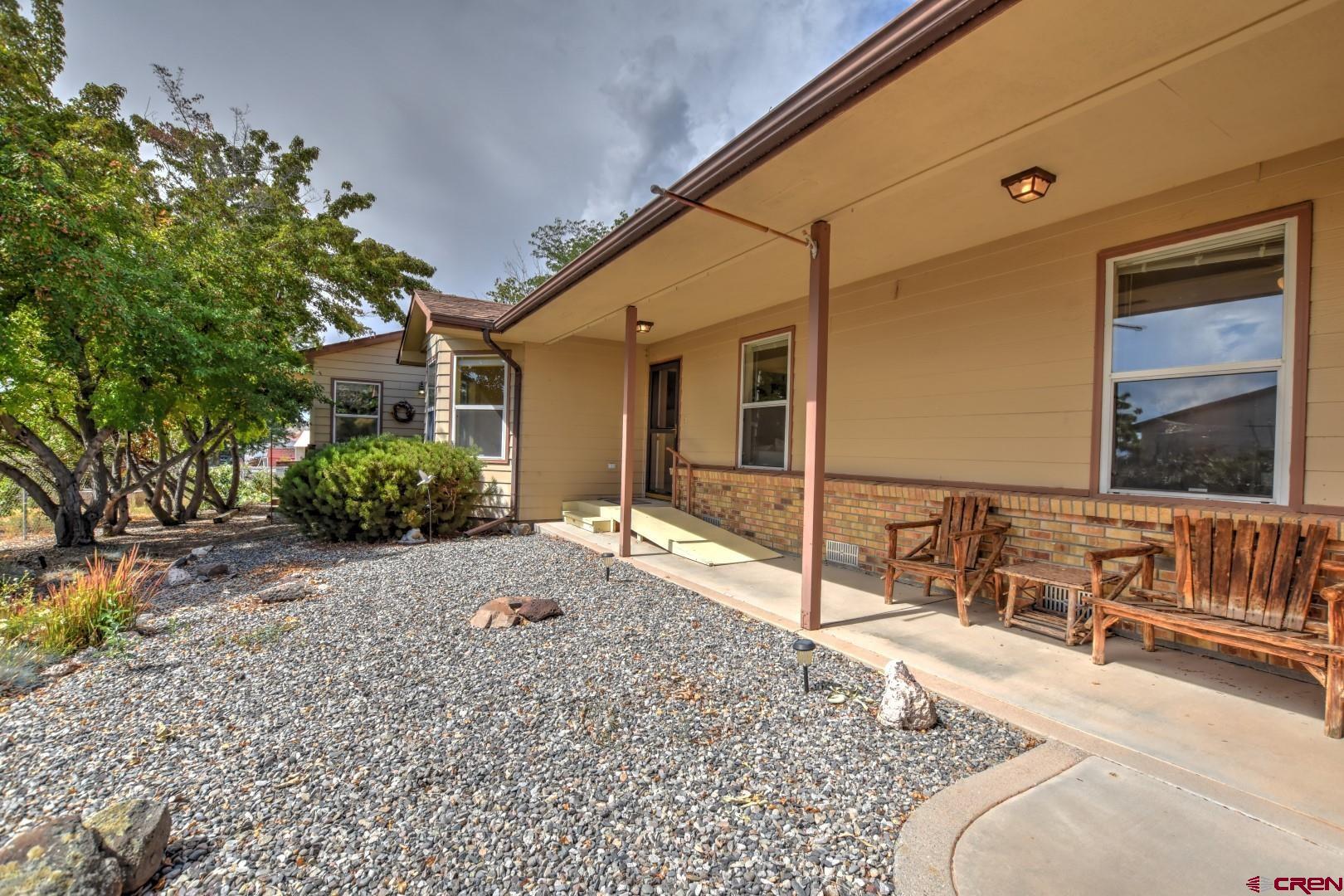 20607 Del Ray Drive Eckert, CO 81418 - Photo 2 of 27 a view of a house with a backyard and porch