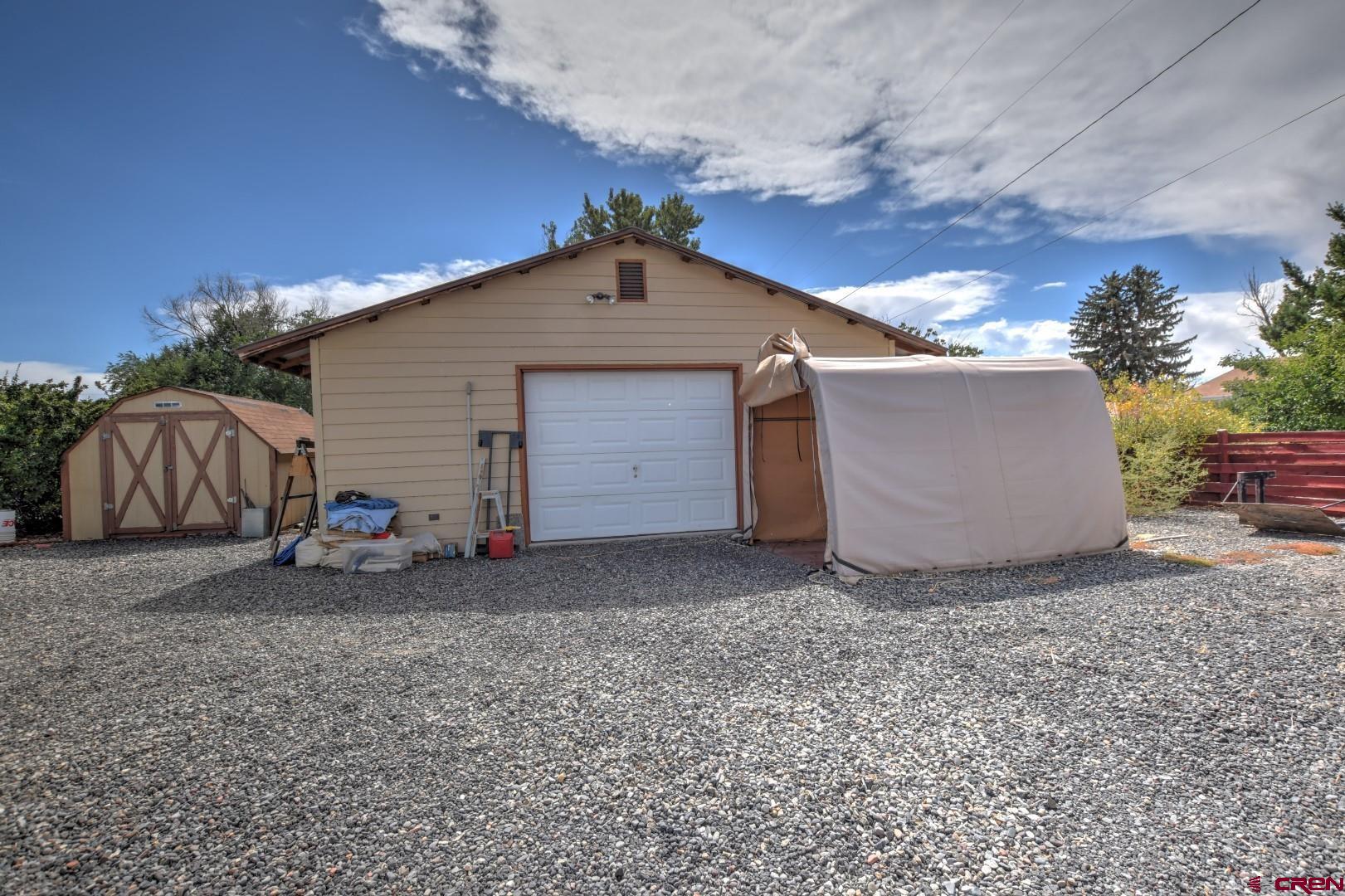 20607 Del Ray Drive Eckert, CO 81418 - Photo 8 of 27 a view of a house with a yard and garage