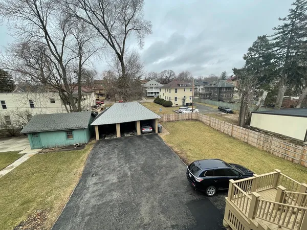 a view of a swimming pool with lounge chair