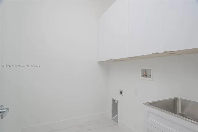a bath room with a sink and a bath tub