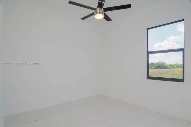 a view of a house with a big yard