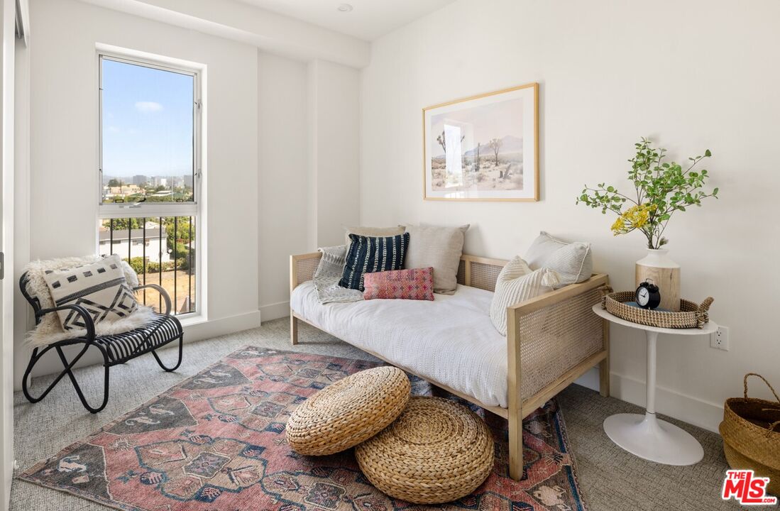 2600 South Sepulveda Boulevard, Unit 401 Los Angeles, CA 90064 - Photo 16 of 33 a living room with furniture and wooden floor
