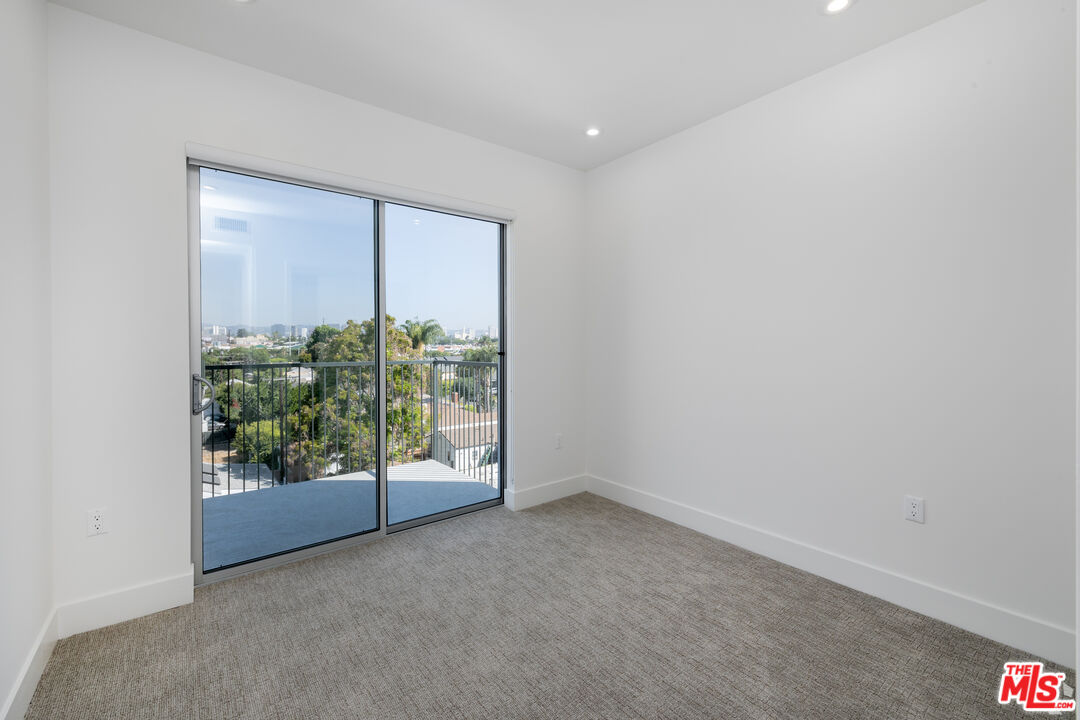 2600 South Sepulveda Boulevard, Unit 401 Los Angeles, CA 90064 - Photo 31 of 33 a view of an empty room with a window