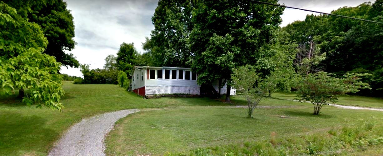 2915 Distillery Road Greenbrier, TN 37073 - Photo 1 of 5 a view of a house with a backyard