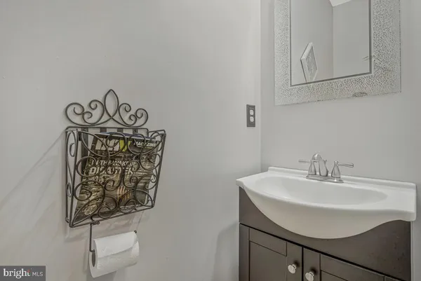 a bedroom with a bed closet and a window