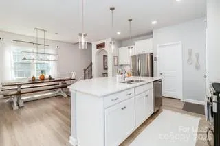 a bathroom with a sink double vanity and a mirror