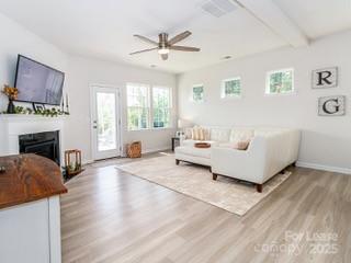 4268 Coachwhip Avenue, Unit 92 Lancaster, SC 29720 - Photo 14 of 36 a living room with furniture and a flat screen tv