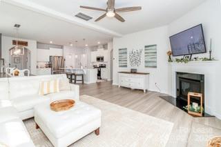 4268 Coachwhip Avenue, Unit 92 Lancaster, SC 29720 - Photo 15 of 36 a living room with furniture and a fireplace
