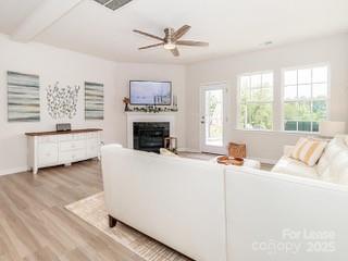 4268 Coachwhip Avenue, Unit 92 Lancaster, SC 29720 - Photo 16 of 36 a living room with furniture and a fireplace