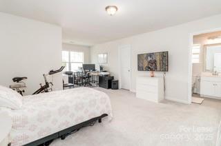 4268 Coachwhip Avenue, Unit 92 Lancaster, SC 29720 - Photo 30 of 36 a bedroom with a bed and white cabinets