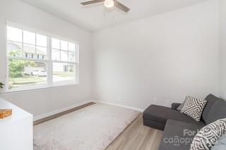 4268 Coachwhip Avenue, Unit 92 Lancaster, SC 29720 - Photo 5 of 36 a bedroom with a bed and a window