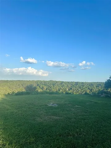 a view of an ocean with a big yard