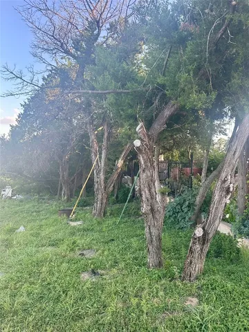 a view of a house with a park