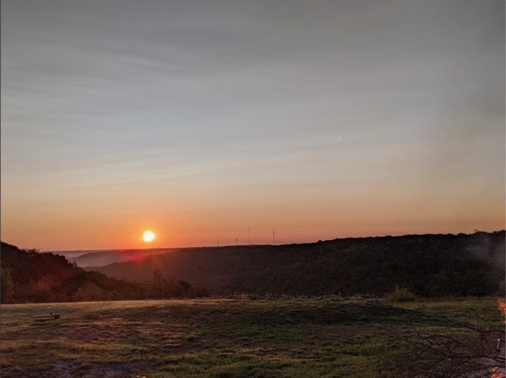 10519 Ridge Rim Drive Leander, TX 78641 - Photo 10 of 12 a view of mountain and sunset