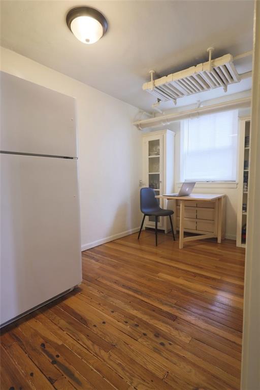 50 Academy Avenue, Unit 31 Pittsburgh, PA 15228 - Photo 7 of 13 a view of a livingroom with furniture and wooden floor